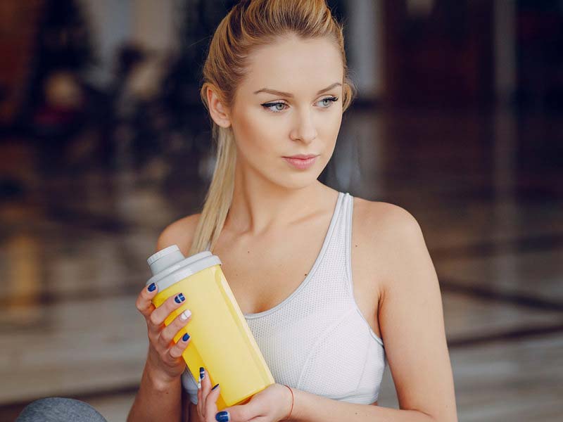 Woman Drinking a Shake - Avada Sports ANNA WILZKO